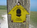 A South Downs Way sign from up on the Seven Sisters.